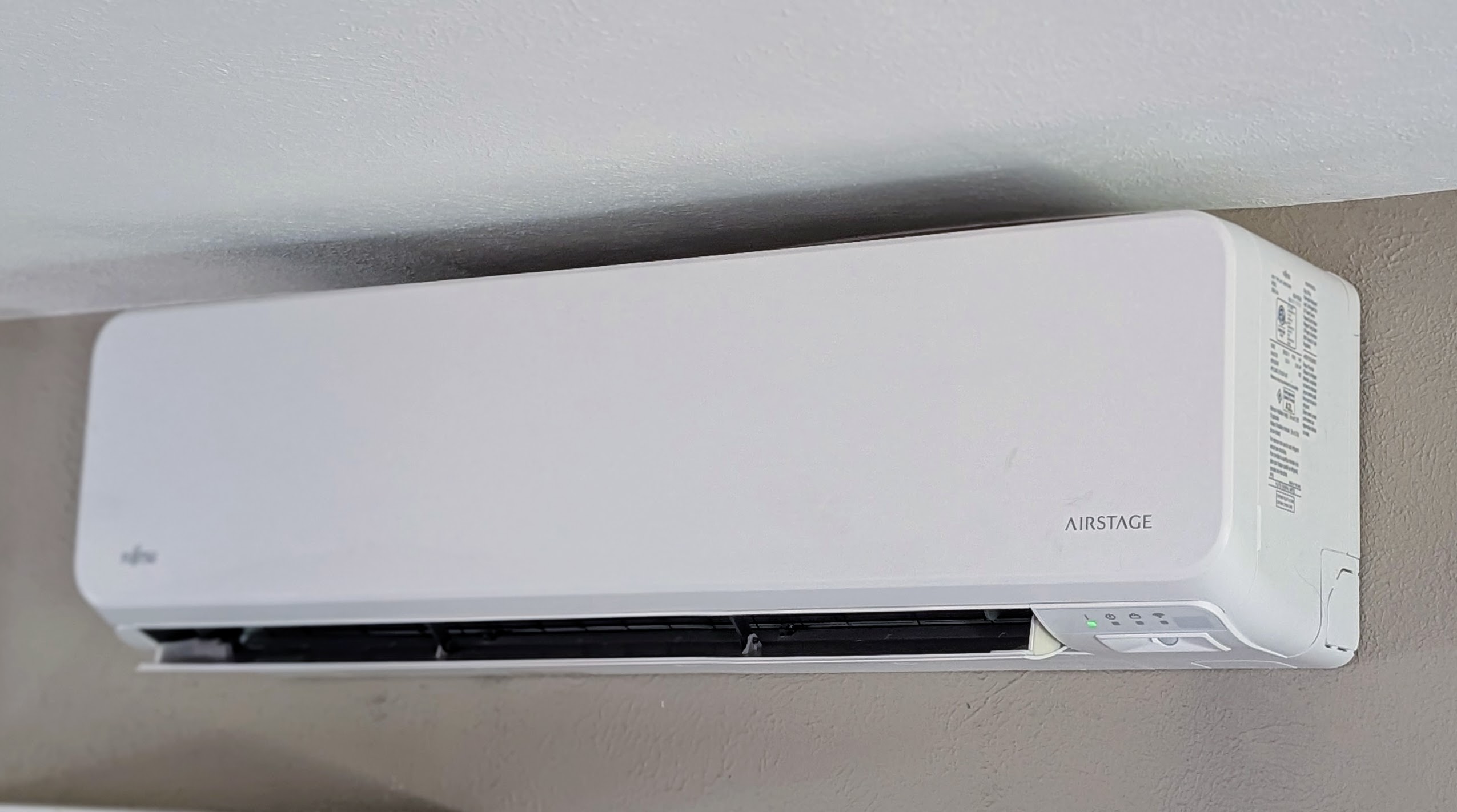 a Fujitsu 15,000 BTU wall mounted mini-split indoor unit