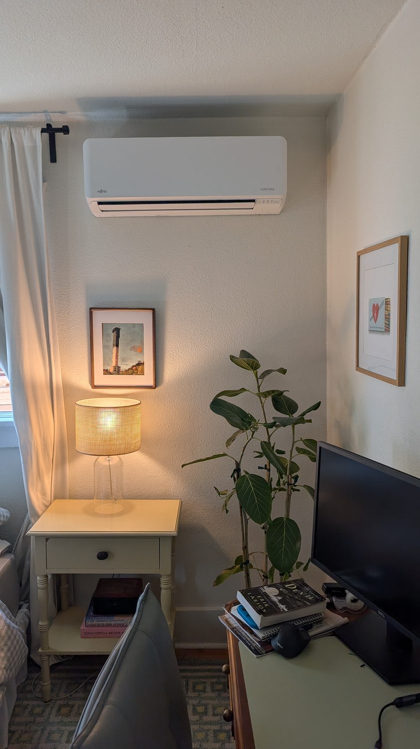 Wall-mounted ductless mini-split installed in a living room